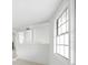 Bright room featuring bright white paint, baseboards, and durable flooring at 161 Bolender Rd, Auburndale, FL 33823
