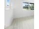 Bright living room showcasing bright white paint, baseboards, and durable flooring at 161 Bolender Rd, Auburndale, FL 33823