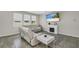 Bright living room with a fireplace and comfortable seating at 1821 Benevento St, St Cloud, FL 34771