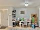 Dining area with table and chairs, neutral walls, and natural light at 2 Clear Pl, Ocala, FL 34472