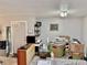 View of kitchen bar and adjacent area with boxes and various household items at 2 Clear Pl, Ocala, FL 34472