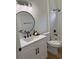 Bathroom with modern fixtures, vanity with under-mount sink, and shower with tile surround at 2049 Crosscreek Ct, Oviedo, FL 32766