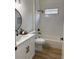 Bathroom with white subway tiles, modern fixtures, and a sleek vanity at 2049 Crosscreek Ct, Oviedo, FL 32766