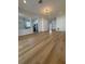 Open-concept living room showcasing modern flooring and lots of natural light at 2049 Crosscreek Ct, Oviedo, FL 32766