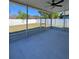 Relaxing screened lanai with a ceiling fan overlooking the backyard and the white fence at 2049 Crosscreek Ct, Oviedo, FL 32766