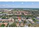 Aerial view of neighborhood showcasing the homes and close proximity to amenities at 214 Glasgow Ct, Davenport, FL 33897