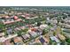 Aerial view of neighborhood featuring pool homes close to community amenities and residences at 214 Glasgow Ct, Davenport, FL 33897