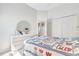 Bright bedroom with carpet and light-colored furnishings at 214 Glasgow Ct, Davenport, FL 33897