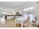 Bright kitchen featuring stainless steel appliances and convenient access to the living spaces at 214 Glasgow Ct, Davenport, FL 33897