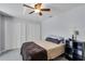 Bedroom features dual closets, providing ample storage space at 2203 Essex Dr, Ocoee, FL 34761