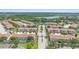 Well-maintained community with lush landscaping, a community pool, and convenient access to amenities at 2488 Hassonite St, Kissimmee, FL 34744