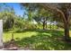Lush backyard space with large trees providing plenty of shade at 2488 Hassonite St, Kissimmee, FL 34744