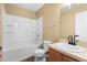 This is a standard bathroom with a shower and tub combo, vanity and medicine cabinet at 2488 Hassonite St, Kissimmee, FL 34744
