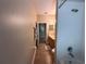 Bathroom featuring shower with tub, vanity, and doorway to bedroom at 2585 Woodside Ridge Dr, Apopka, FL 32712