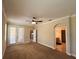 Neutral Primary bedroom with carpet flooring and access to a balcony and ensuite bathroom at 2585 Woodside Ridge Dr, Apopka, FL 32712