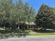 Charming single-story home with manicured landscaping and mature trees at 2585 Woodside Ridge Dr, Apopka, FL 32712