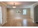 Open living area with tile flooring, recessed lighting and billiards light fixture at 2585 Woodside Ridge Dr, Apopka, FL 32712