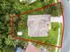 Aerial view of roof and lot showing mature trees, landscaping, and privacy at 2888 Middleton Cir, Kissimmee, FL 34743