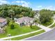 Aerial view of home showcasing landscaping and location, highlighting the property's curb appeal and neighborhood at 2888 Middleton Cir, Kissimmee, FL 34743