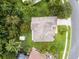 An aerial view of a single Gathering home on a large, well-maintained lot with mature trees at 2888 Middleton Cir, Kissimmee, FL 34743
