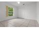 Bright bedroom with white walls, closet and large window at 2888 Middleton Cir, Kissimmee, FL 34743