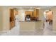 Kitchen with tile flooring, wood cabinetry and countertop at 2888 Middleton Cir, Kissimmee, FL 34743