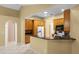 Open kitchen with wood cabinets and tile flooring at 2888 Middleton Cir, Kissimmee, FL 34743