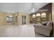 Inviting living room with built-in shelving, sliding glass doors, and a neutral color palette for relaxation at 2888 Middleton Cir, Kissimmee, FL 34743