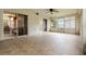 Large sunroom featuring tile flooring, ceiling fan, and multiple access points at 2888 Middleton Cir, Kissimmee, FL 34743