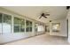 Sunroom offering views of the backyard, ceiling fan, and access to the main house at 2888 Middleton Cir, Kissimmee, FL 34743