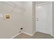 Laundry room with washer hookups and a door to the exterior at 3014 Linmont Ln, Eustis, FL 32726