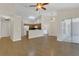 Spacious living area with an open floor plan and sliding glass doors to the backyard at 3014 Linmont Ln, Eustis, FL 32726