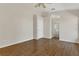 Spacious main bedroom with hardwood floors and ensuite bathroom access at 3014 Linmont Ln, Eustis, FL 32726