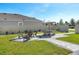 Backyard with pavers, landscaping, and outdoor seating area at 3077 Nottel Dr, St Cloud, FL 34772