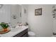 Bright powder room with a decorative mirror and a stylish countertop at 3077 Nottel Dr, St Cloud, FL 34772