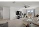 Large bonus room featuring plush carpet, neutral paint, and a modern ceiling fan at 3077 Nottel Dr, St Cloud, FL 34772