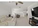 Bonus room featuring plush carpet, neutral paint, and a modern ceiling fan at 3077 Nottel Dr, St Cloud, FL 34772