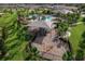 The aerial view shows the playground with sun shelter and other recreational amenities at 3077 Nottel Dr, St Cloud, FL 34772