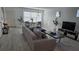 Bright living room with modern decor and wood-look flooring at 3128 Camino Real N Dr, Kissimmee, FL 34744