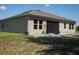 Backyard featuring a screened in lanai and low maintenance landscaping at 5161 Kingwell Cir, Oviedo, FL 32765