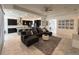 Open-concept living room with kitchen, dining area, and tile floors at 5161 Kingwell Cir, Oviedo, FL 32765