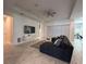 Inviting living area showcasing a ceiling fan, recessed lights, and a sleek, modern aesthetic at 5161 Kingwell Cir, Oviedo, FL 32765