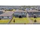 Expansive backyard with well-maintained lawn, surrounded by a privacy fence in a Gathering-friendly neighborhood at 5291 Meredrew Ln, St Cloud, FL 34771