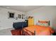 Well-decorated bedroom with two beds, vintage decor, and a comfortable atmosphere at 5291 Meredrew Ln, St Cloud, FL 34771