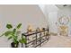 Inviting foyer with stylish decor, tiled flooring, and a view of the staircase at 5291 Meredrew Ln, St Cloud, FL 34771