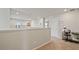 Spacious loft area with neutral walls, bright light and a desk at 5291 Meredrew Ln, St Cloud, FL 34771