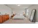 This main bedroom is spacious and features neutral decor, two windows, and carpet at 5291 Meredrew Ln, St Cloud, FL 34771