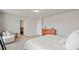 This main bedroom features neutral decor, carpet, and access to a walk-in closet at 5291 Meredrew Ln, St Cloud, FL 34771