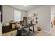 Bright home office with decor and a desk set against neutral walls and light flooring at 5291 Meredrew Ln, St Cloud, FL 34771