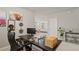 Bright, modern office space flows into a naturally lit dining and living area at 5291 Meredrew Ln, St Cloud, FL 34771